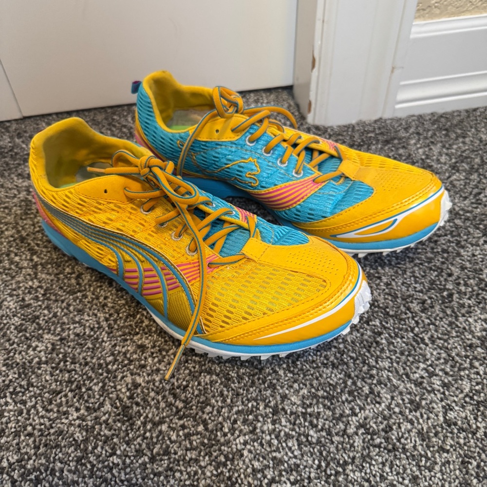 PUMA Sneakers Complete Theseus Cleat Yellow With Turquoise Laceup Women's Sz 9.5